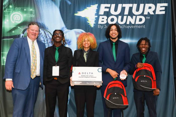 Team GGB at the 2025 Future Bound awards gala as they accept the Delta Social Impact Award.