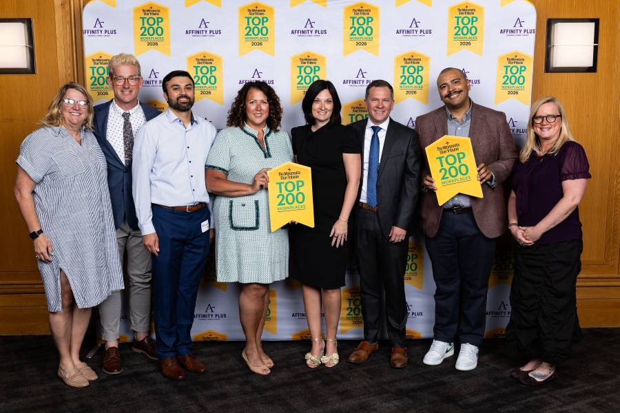 Photo of JA North Staff members posing at the Top 200 Workplaces event