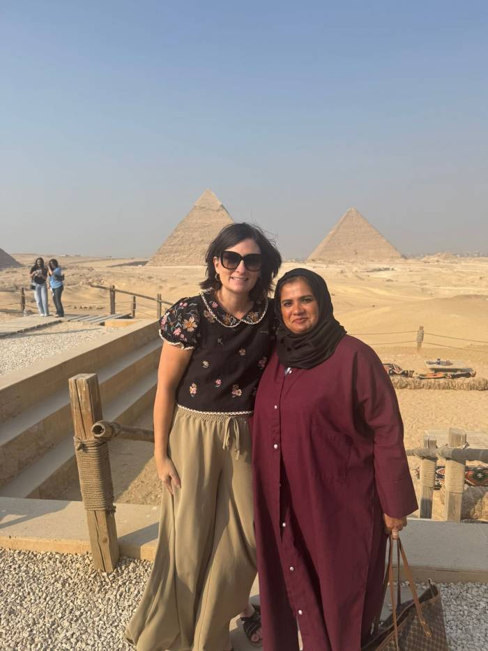President & CEO, Sara Dziuk, and Hana Sarwani of INJAZ Bahrain at the Great Pyramids