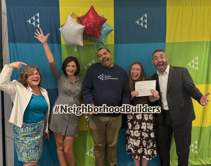 Staff from JA North pose with Bank of America representatives and receive the Neighborhood Builders honor.