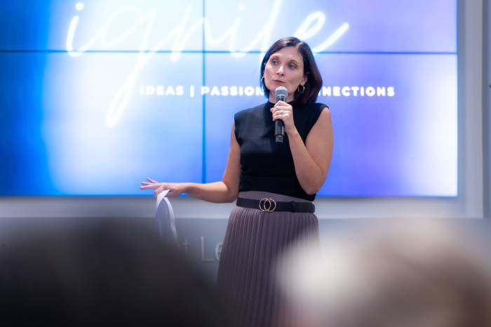 President & CEO, Sara Dziuk, addresses attendees at our 2024 Ignite Celebration.