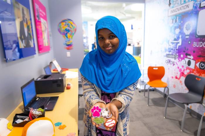 Student with items created in JA BizTown Entrepreneur Hub